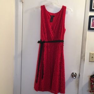 Sleeveless RED DRESS with Black ribbon belt.